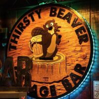 Thirsty Beaver garage bar sign.