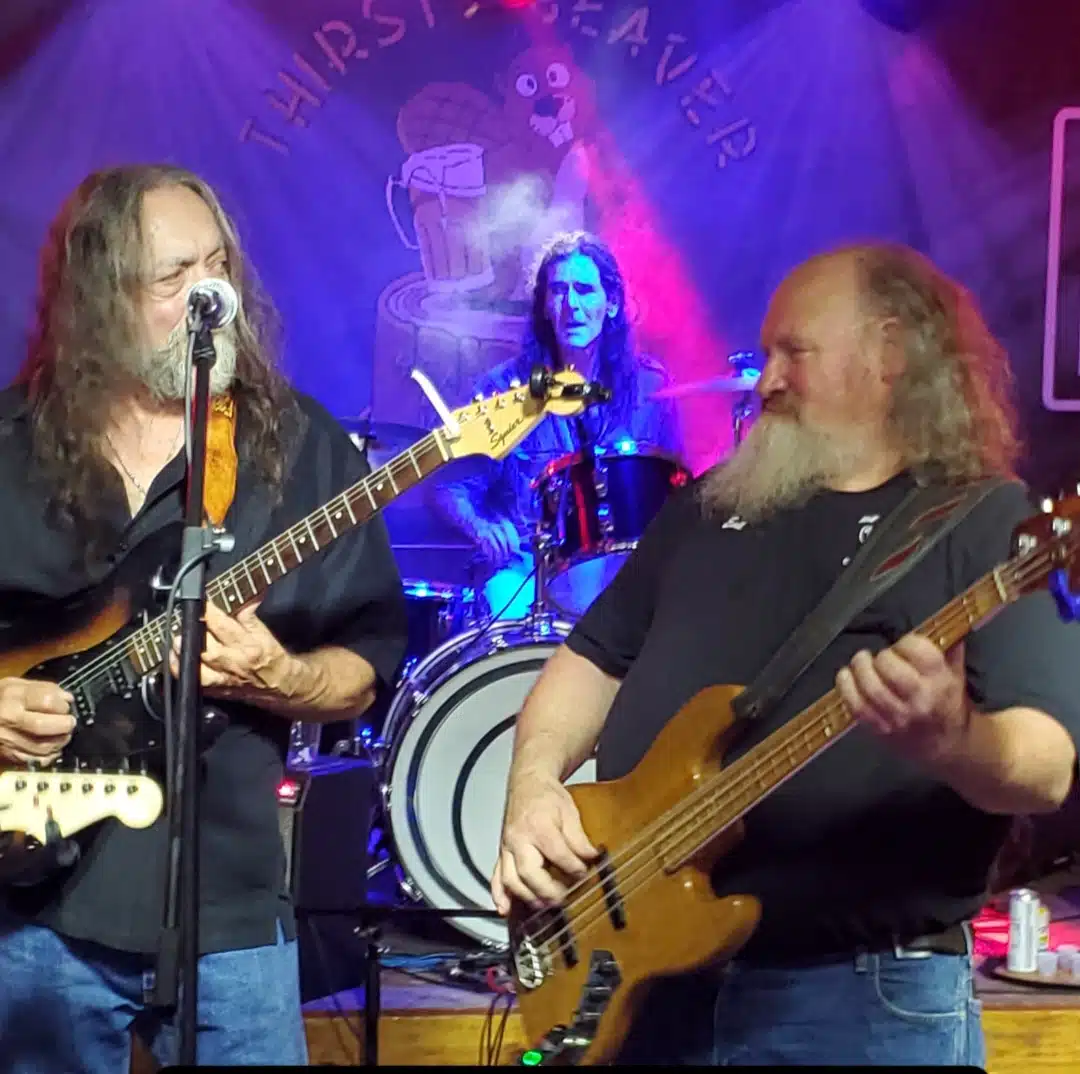 A band playing on a stage.