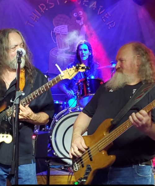 A band playing on a stage.