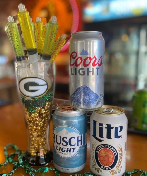 Cans of beer and jello shots.